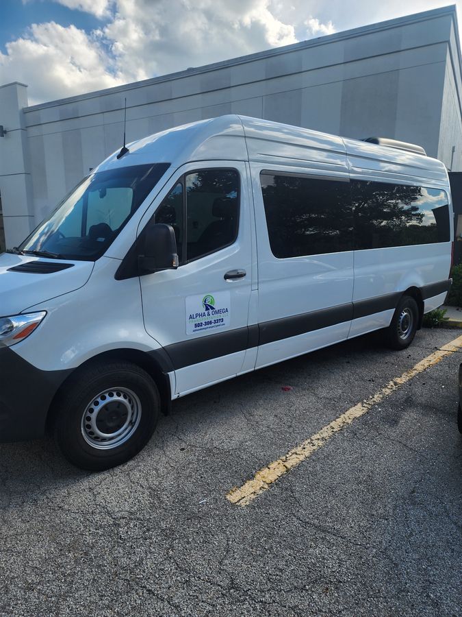 Alpha and Omega Transportation Mercedes-Benz Sprinter van exterior full side view